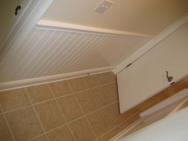 wainscotting and coffered ceilings